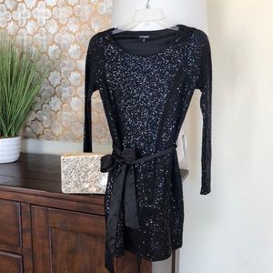 NWT XS Mini black lightly sequined dress.